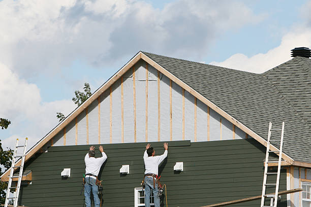 Professional Siding Contractor technician working in Brookeville, MD